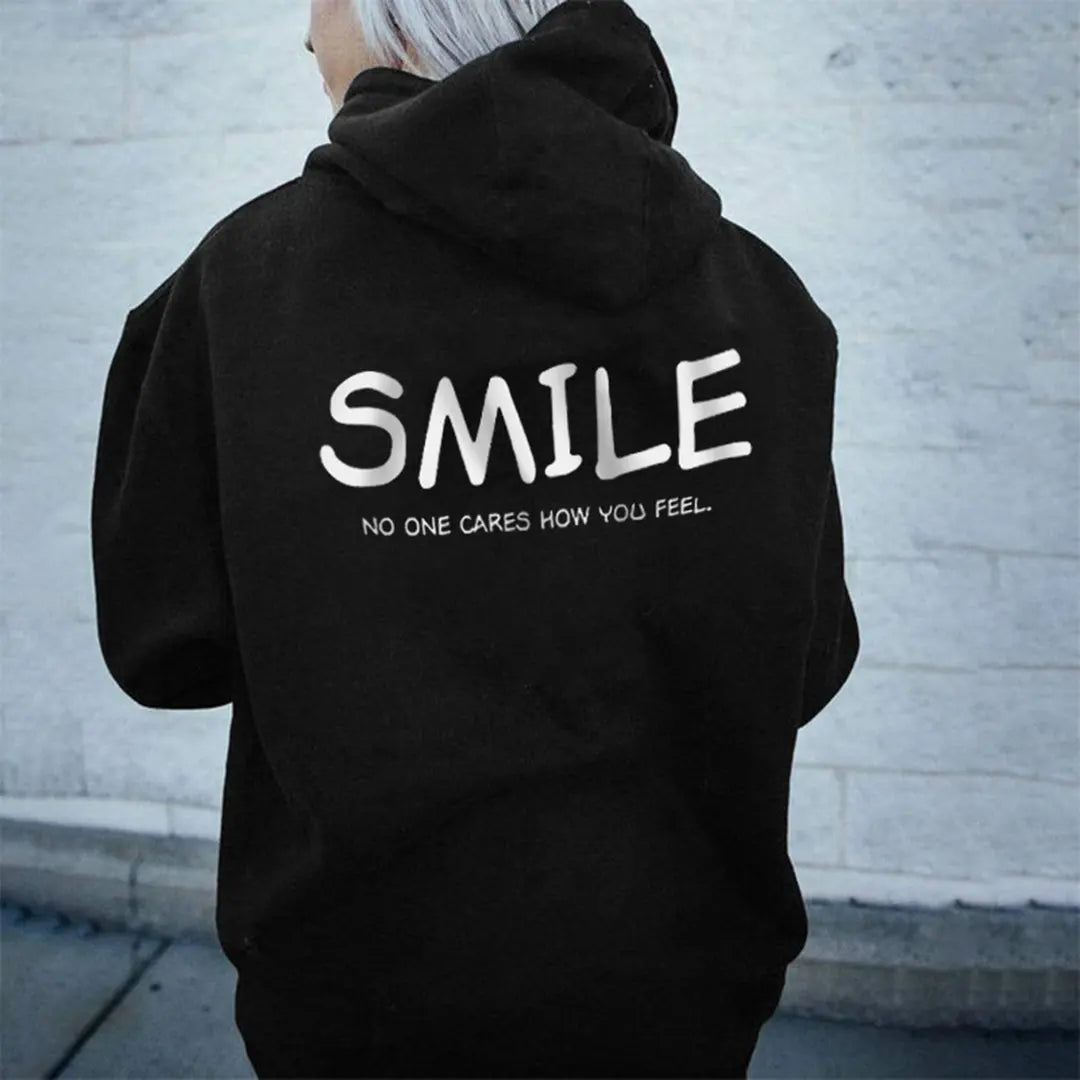 Sudadera “SMILE – No One Cares”