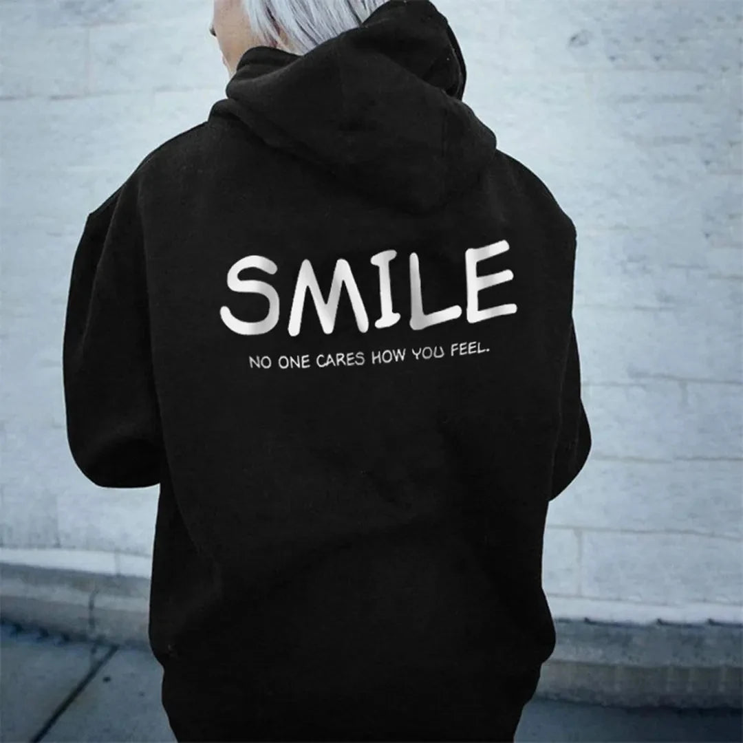 Sudadera “SMILE – No One Cares”