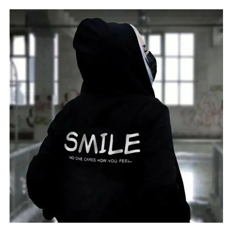Sudadera “SMILE – No One Cares”