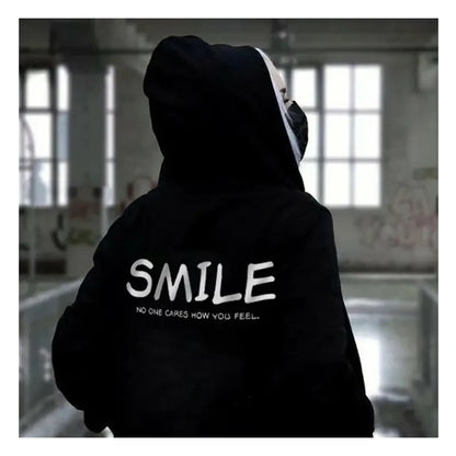 Sudadera “SMILE – No One Cares”